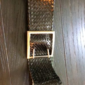 Black braided belt with silver buckle.